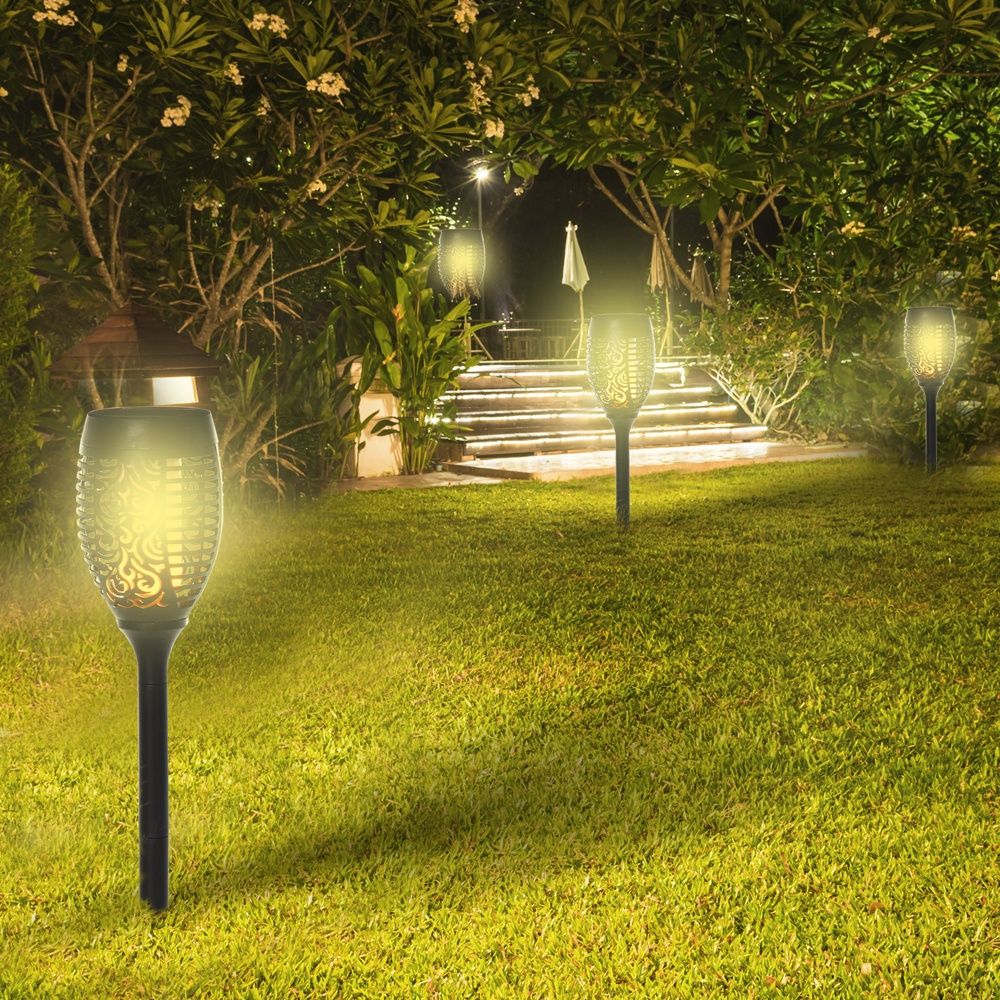 Solar Garden Lights Set med 4 – Varmvitt flimrande LED utomhusdekor IP44 Vattentät 6-8 timmar långvarig svart