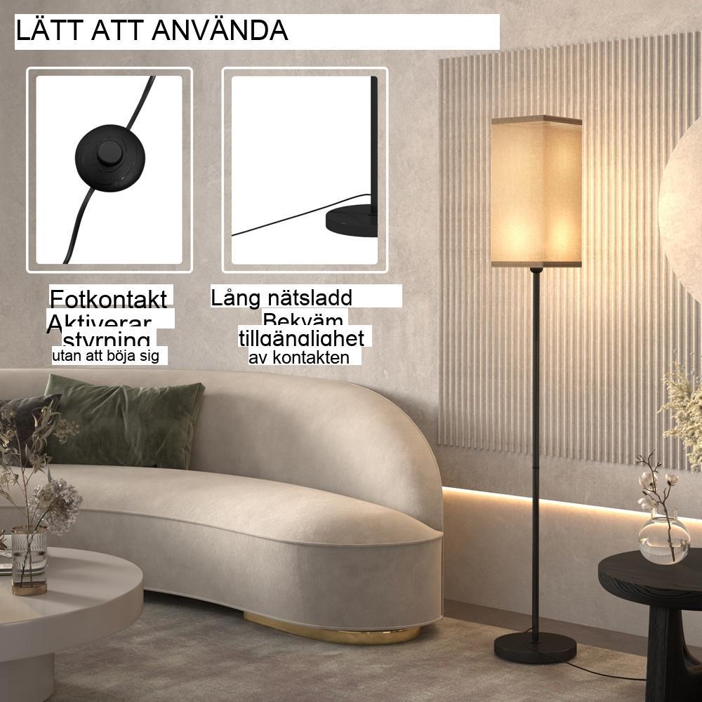 Modern svart golvlampa med linneskärm och fotkontakt